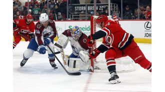 Avalanche dominates Devils after rocky start, secures victory.