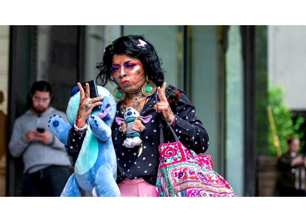 Woman jailed for bringing golden gun into Sydney airport after 'forgetting' it was in her bag.