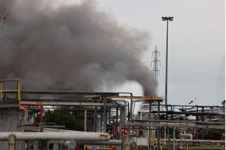 Explosion at oil depot kills 2, 3 missing.