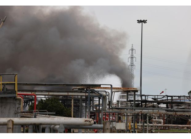 Explosion at oil depot kills 2, 3 missing.