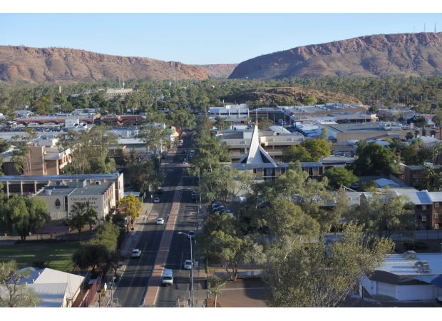 Woman allegedly raped by stranger in NT home, leads to charges being laid.