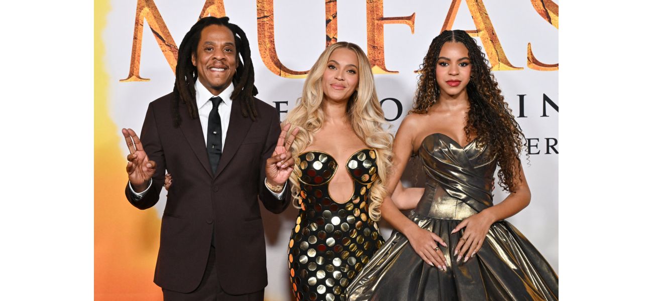 Jay-Z, Beyoncé, and their daughter Blue Ivy attend red carpet event after rapper faces rape allegations involving a 13-year-old girl.