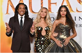 Jay-Z, Beyoncé, and their daughter Blue Ivy attend red carpet event after rapper faces rape allegations involving a 13-year-old girl.