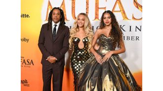 Jay-Z and Beyoncé proudly accompany their daughter, Blue Ivy Carter, to the premiere of The Lion King.
