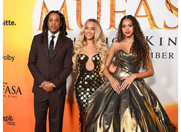 Jay-Z and Beyoncé proudly accompany their daughter, Blue Ivy Carter, to the premiere of The Lion King.