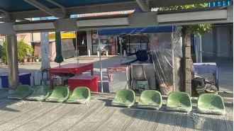 A newly constructed bus stand has been rendered unusable as builders mistakenly poured concrete over it.