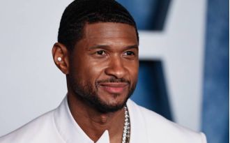 Usher attends opening of content studio at Boys and Girls Club in Atlanta.