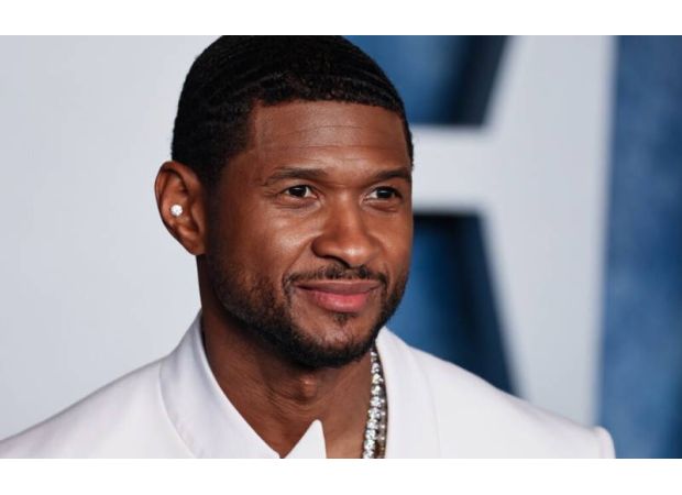 Usher attends opening of content studio at Boys and Girls Club in Atlanta.