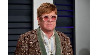 Elton John misses his old-fashioned birth name, says it left a 'void' when he changed it.