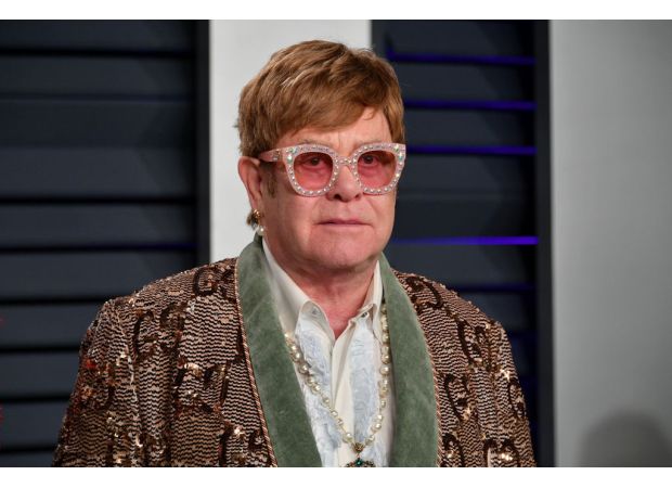 Elton John misses his old-fashioned birth name, says it left a 'void' when he changed it.
