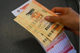 A lottery winner is battling for the remaining $394 million jackpot after losing their second ticket.