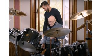 After 15 years of poor health, Phil Collins returns to the drums for the first time.
