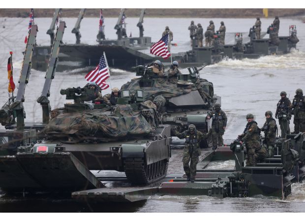 NATO urges change to 'wartime mentality' in response to Russian threats.