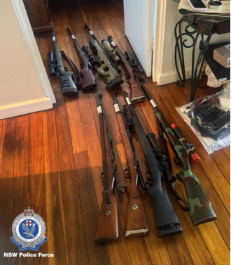 Police confiscated over 70 firearms and other weapons from a residence in north-west Sydney.