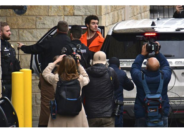 The suspect in the CEO murder was plagued by back pain and cognitive difficulties, as seen in his social media posts.