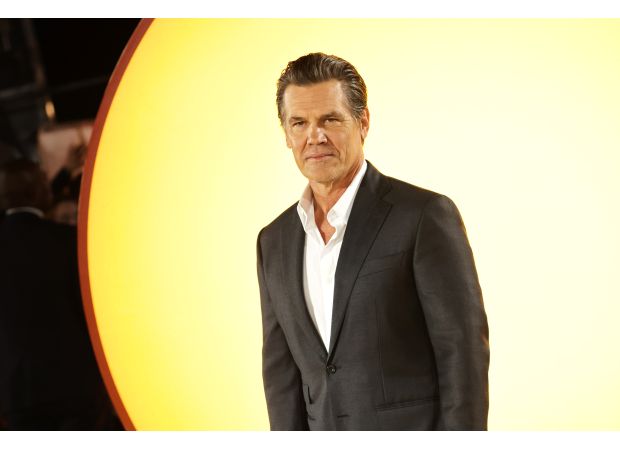 A famous Hollywood figure had a drug-induced experience at 13, communicating with a comforting fireplace.