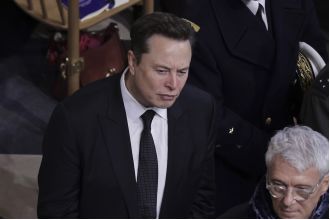 Musk claims US wants him to pay for revealing his Twitter stock purchases.