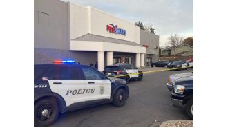 Police apprehend one young and one older suspect in connection with a shooting at a PetSmart store in Lakewood on Friday.