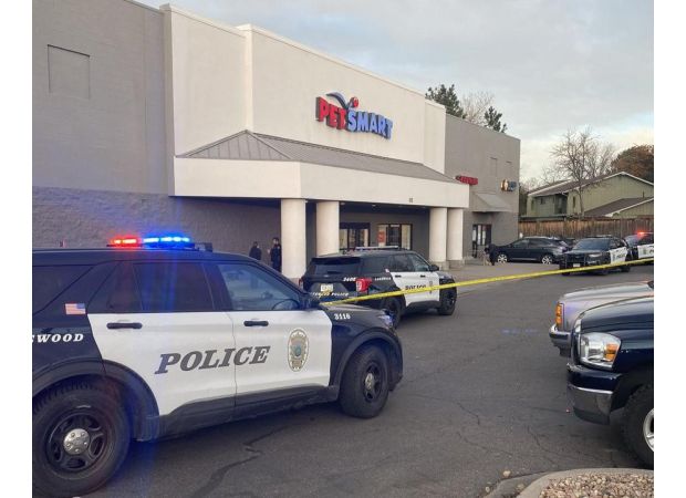Police apprehend one young and one older suspect in connection with a shooting at a PetSmart store in Lakewood on Friday.