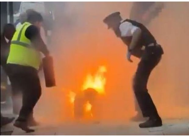 In a dispute with his partner, a man lit himself on fire in front of law enforcement.