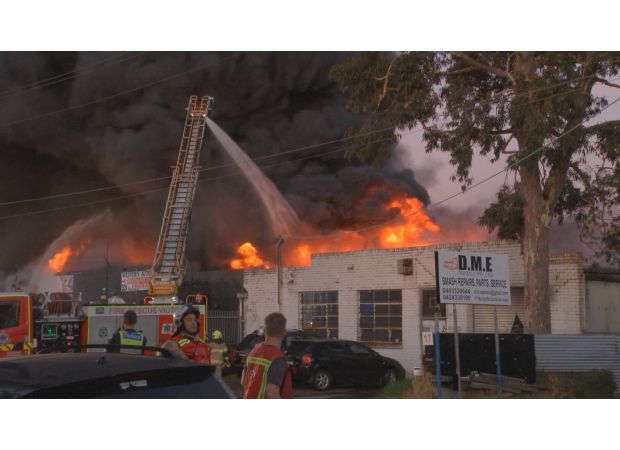 A man is in hospital after a serious fire at a mechanic shop in Melbourne.