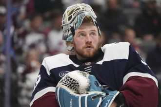 Rookie goalie Blackwood shines in first game with Avalanche, helping them secure a win against the Predators.