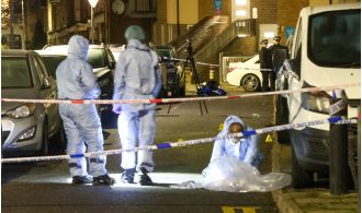 One woman dead and two men hurt in north London shooting.