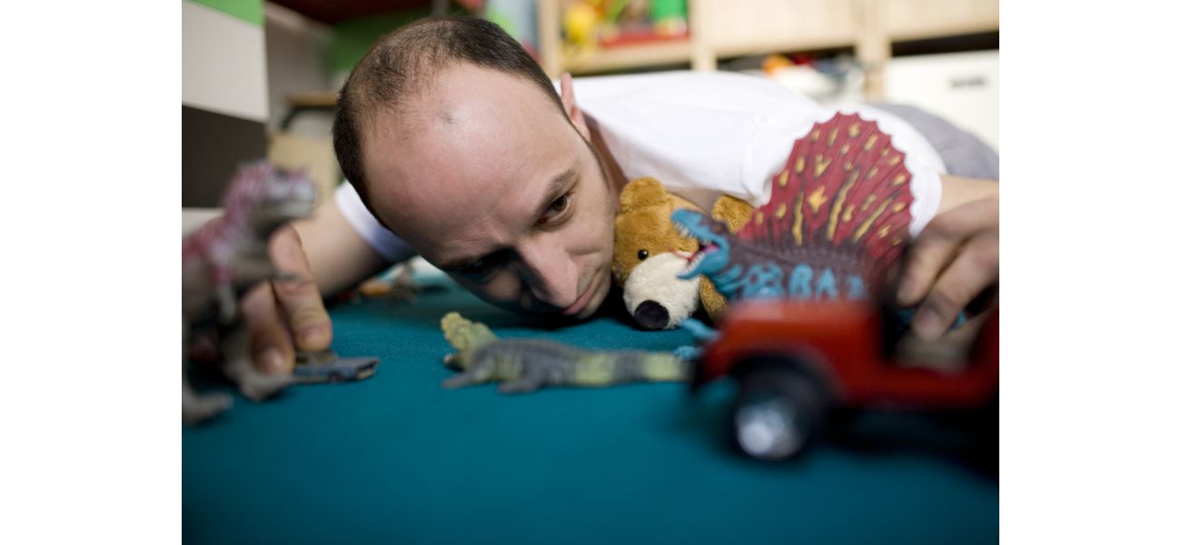 A 40-year-old man receives kids' toys as Christmas gifts from his spouse.
