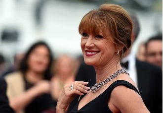 73-year-old ex-Bond girl escapes California wildfires before it's too late.