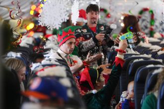 Children are flown to a North Pole experience at a renovated hangar in Denver airport to meet Santa.