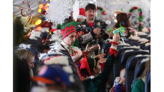 Children are flown to a North Pole experience at a renovated hangar in Denver airport to meet Santa.