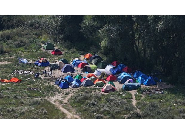 A gunman killed five people in a migrant camp in Dunkirk in a shooting spree.