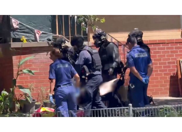 A man and woman were taken hostage in a machete attack on the Mid North coast of New South Wales.