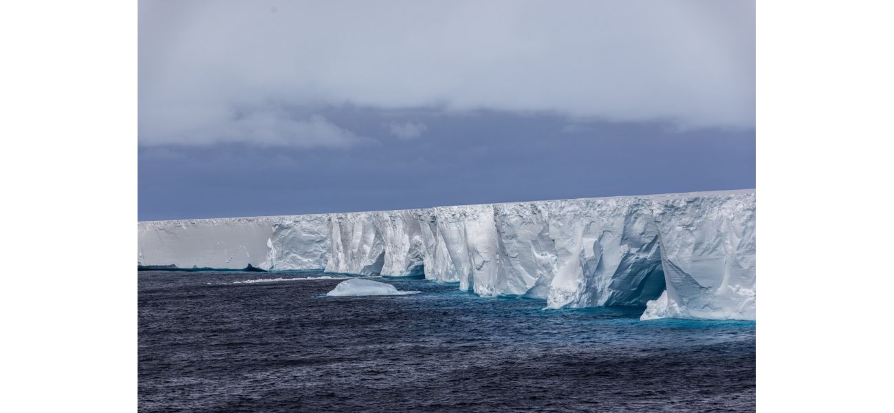 A colossal trillion-ton iceberg adrift in the ocean after breaking off.