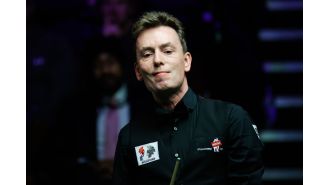 Ken Doherty wins dramatic match with an impressive clearance from 1997, despite experiencing a sudden 