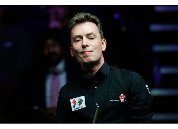 Ken Doherty wins dramatic match with an impressive clearance from 1997, despite experiencing a sudden 