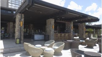 A woman from Australia is recovering in a Fijian hospital from suspected alcohol poisoning and is currently alert and talking.