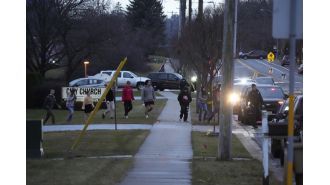 A 17-year-old girl is suspected to be responsible for a school shooting that resulted in the deaths of a student and teacher, according to officials.