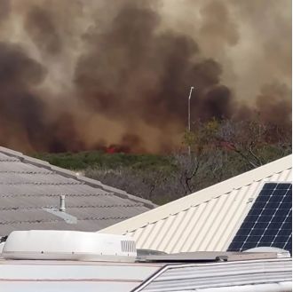 Uncontrolled fire ravages Perth suburb Port Kennedy, causing destruction.