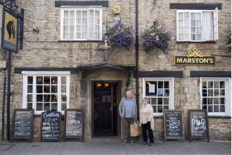 Pubs raising pint price due to National Insurance tax increase.