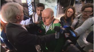 Alan Jones to attend court for first time after charges of sexual assault.