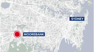 Child hospitalized after being rescued from backyard pool in Sydney.