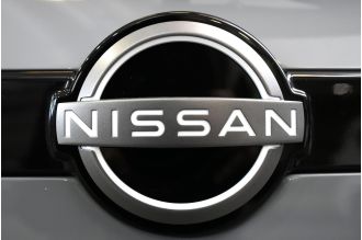 Nissan and Honda discussing partnership, but no decision made on merging.