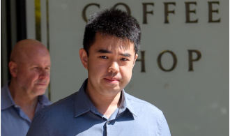 A doctor who secretly recorded patients apologizes in court as he breaks down.