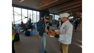 Frontier's inaugural flight from Denver lands in Eagle County, bringing treats and potential pilot strike.