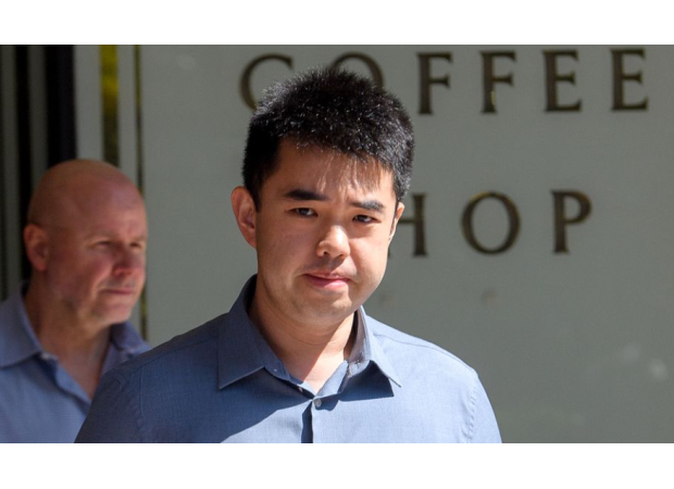 A doctor who secretly recorded patients apologizes in court as he breaks down.