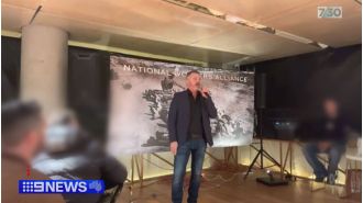 A previous Neighbours actor is accused of making a Nazi gesture and has been charged.