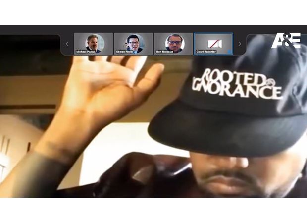 Kanye West's strange deposition video shows him covering his face and arguing with a lawyer he calls 