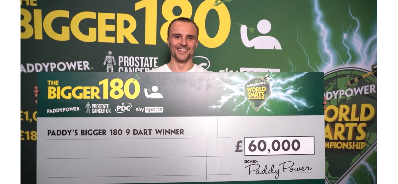 Fan ecstatic after scoring £60,000 for 9-dart finish at Darts Championship.