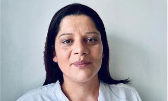 Nurse suspended for sharing 'sexy pics' with junior staff from her phone.